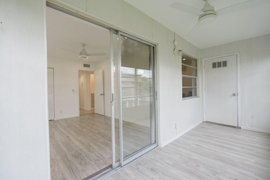 Second-floor 2 bed / 2 bath condo with garden views in the