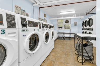 Enter and by in awe by the wall of windows at 3935 Blackstone