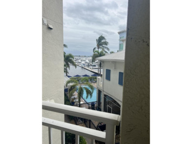 ALL ABOUT THE LIFESTYLE AT THE HARBORAGE! GREAT VIEW OVER POOL