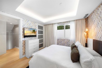 Experience the pinnacle of oceanfront living, a turnkey 4-bdrm