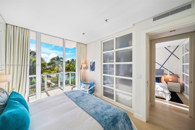 Experience the pinnacle of oceanfront living, a turnkey 4-bdrm