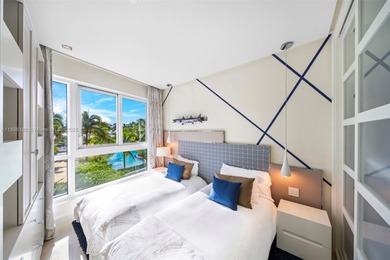 Experience the pinnacle of oceanfront living, a turnkey 4-bdrm