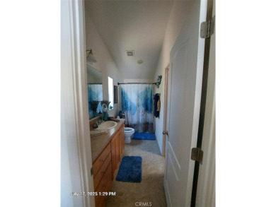 This beautiful mobile home is located in a most desirable  adult