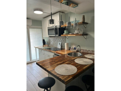 Beach Days Should be Mandatory! Charming Waterfront Condo -