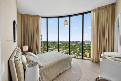 Positioned on a premier penthouse level, this residence