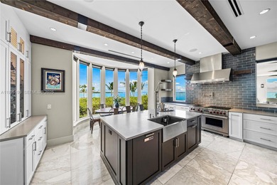 Rarely Available Bayfront Estate! Experience unobstructed