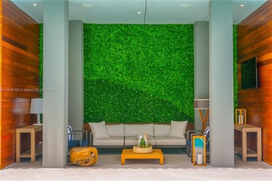 Positioned on a premier penthouse level, this residence