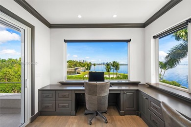 Rarely Available Bayfront Estate! Experience unobstructed