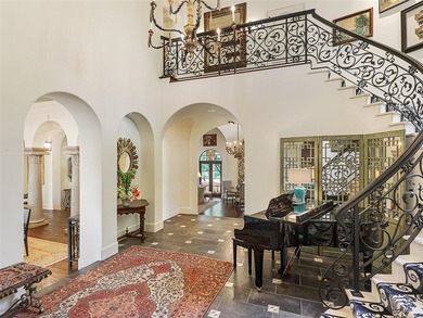 WOW!  Nestled within the coveted Private Enclave of Gated and