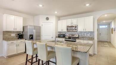 Well maintained home in gated community of Promenade Estate