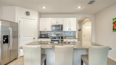 Well maintained home in gated community of Promenade Estate