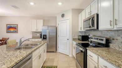 Well maintained home in gated community of Promenade Estate