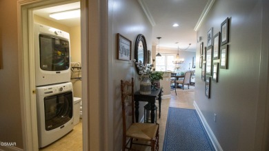 AWESOME CORNER UNIT WITH BOAT SLIP AND BOAT LIFT! Lakefront