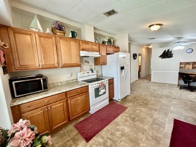 "Exceptionally Priced Home with Oversized Kitchen, Lanai &