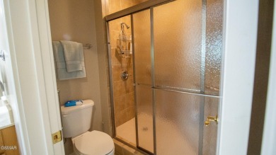 AWESOME CORNER UNIT WITH BOAT SLIP AND BOAT LIFT! Lakefront