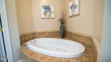 AWESOME CORNER UNIT WITH BOAT SLIP AND BOAT LIFT! Lakefront