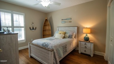 AWESOME CORNER UNIT WITH BOAT SLIP AND BOAT LIFT! Lakefront