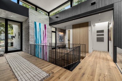 Luxury Lakefront Living! Newly completed and impeccably designed