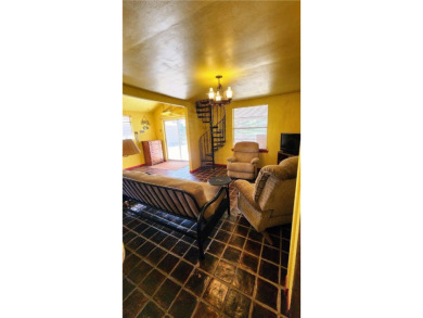 Discover the charm of lakefront living with this fully furnished