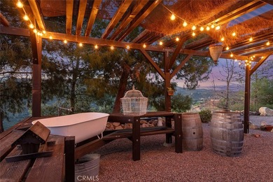 UTMOST PRIVACY & STUNNING VIEWS FROM THIS 10-ACRE SINGLE-STORY