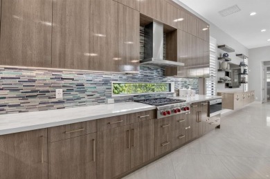 Set on one of the largest and most coveted pie lots in Boca