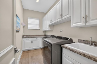 Set on one of the largest and most coveted pie lots in Boca