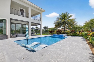 Set on one of the largest and most coveted pie lots in Boca