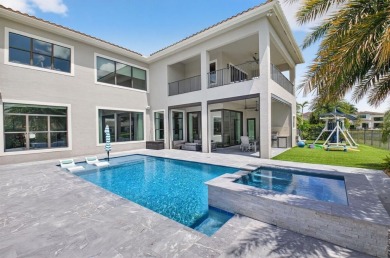 Set on one of the largest and most coveted pie lots in Boca