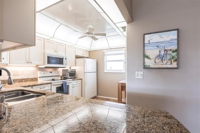 Welcome to this charming penthouse condo located at 3620