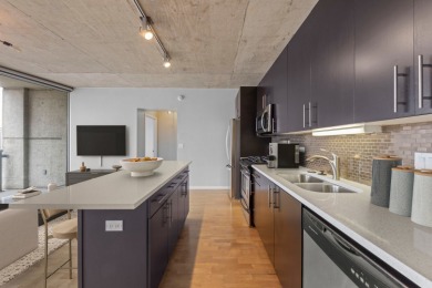 This stunning 1 bed / 1 bath condo in vibrant Printer's