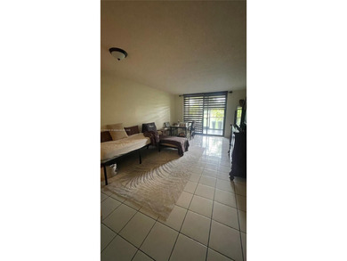 ***Garden Level 2/2 Condo with the Convenience of a House***
