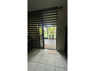 ***Garden Level 2/2 Condo with the Convenience of a House***
