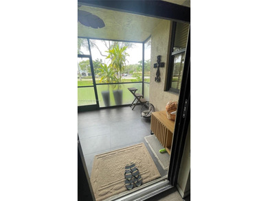 ***Garden Level 2/2 Condo with the Convenience of a House***
