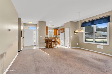 SOUGHT AFTER STAND ALONE CONDO IN SUMMIT TOWNSHIP! Striking curb