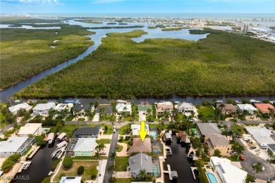 **JUST MINUTES FROM FORT MYERS BEACH, THIS STUNNING COASTAL