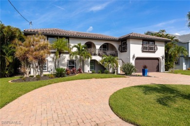 **JUST MINUTES FROM FORT MYERS BEACH, THIS STUNNING COASTAL