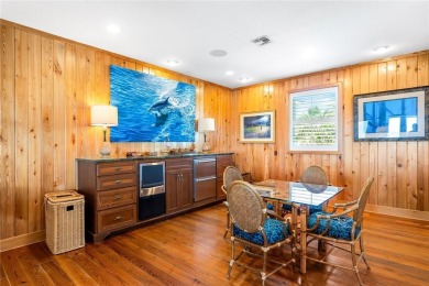 Experience coastal living at its finest in this stunning canal