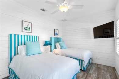 Experience coastal living at its finest in this stunning canal