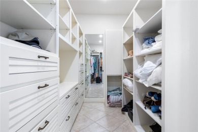 Experience coastal living at its finest in this stunning canal