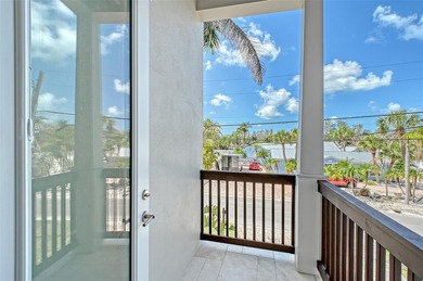 Escape to the ultimate Siesta Key lifestyle with this rarely