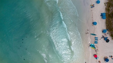 Escape to the ultimate Siesta Key lifestyle with this rarely