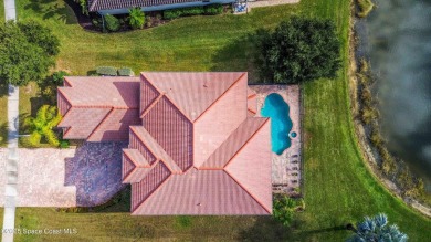 Discover timeless charm in this custom-built lakefront home