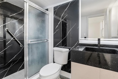 Stunningly remodeled 2-bed, 2-bath condo. This exquisite