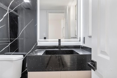 Stunningly remodeled 2-bed, 2-bath condo. This exquisite