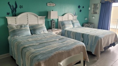 Elevate your beachside getaway with this beautiful efficiency