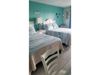 Elevate your beachside getaway with this beautiful efficiency