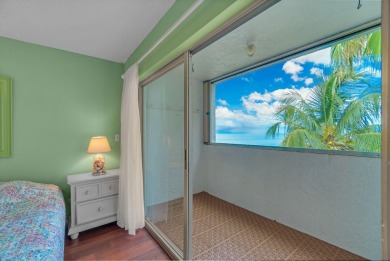 BEAUTIFUL CONDO WITH OCEAN VIEWS FOR LESS THAN $480,000!  LIVE