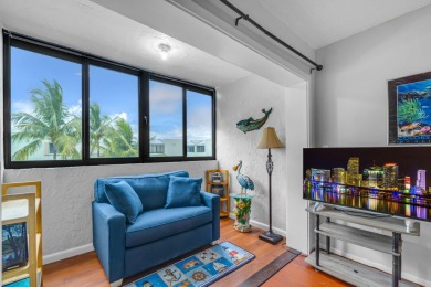 BEAUTIFUL CONDO WITH OCEAN VIEWS FOR LESS THAN $480,000!  LIVE