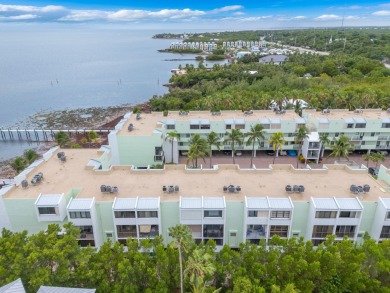 BEAUTIFUL CONDO WITH OCEAN VIEWS FOR LESS THAN $480,000!  LIVE
