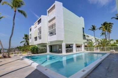 BEAUTIFUL CONDO WITH OCEAN VIEWS FOR LESS THAN $480,000!  LIVE